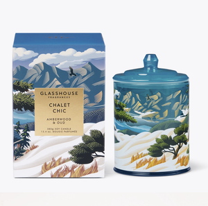 Glasshouse Fragrances Chalet Chic candle and packaging with mountain and nature design. AMBERWOOD OUD 380g Triple Scented Soy Candle Limited Edition