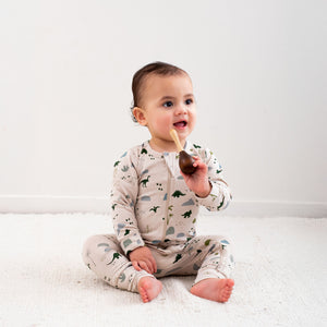 Burrow & Be Jurassic Roam Long Sleeve Zip Suit Baby onesie with dinosaur pattern