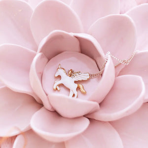 Flying Unicorn Necklace Unicorn necklace on a display card with 'Lauren Hinkley Australia'