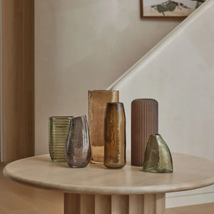 Amalfi Ayla Vase Green A small, asymmetrical translucent glass vase with a smoky gray-green tint