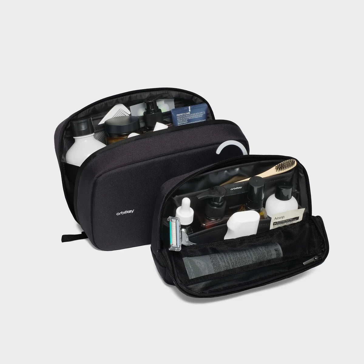 Orbitkey 2-in-1 Toiletry Pouch - Black Two black travel bags with a hook