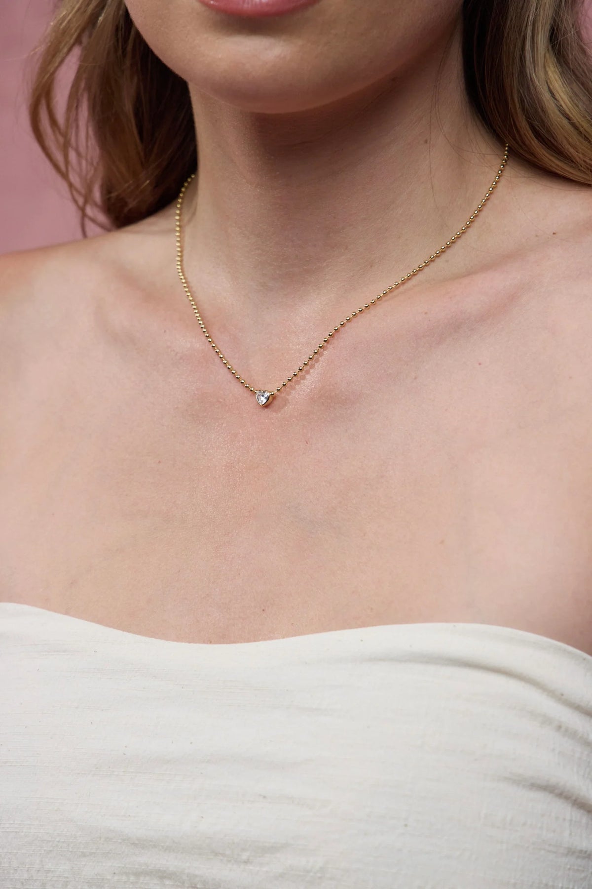 ZAFINO 7842 Amor Necklace Gold beaded necklace with a heart-shaped crystal pendant