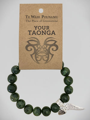 Aroha Charm Nephrite Jade Bead Bracelets Greenstone bracelet with a silver charm on a 'Te Wahi Pouamu' branded card.