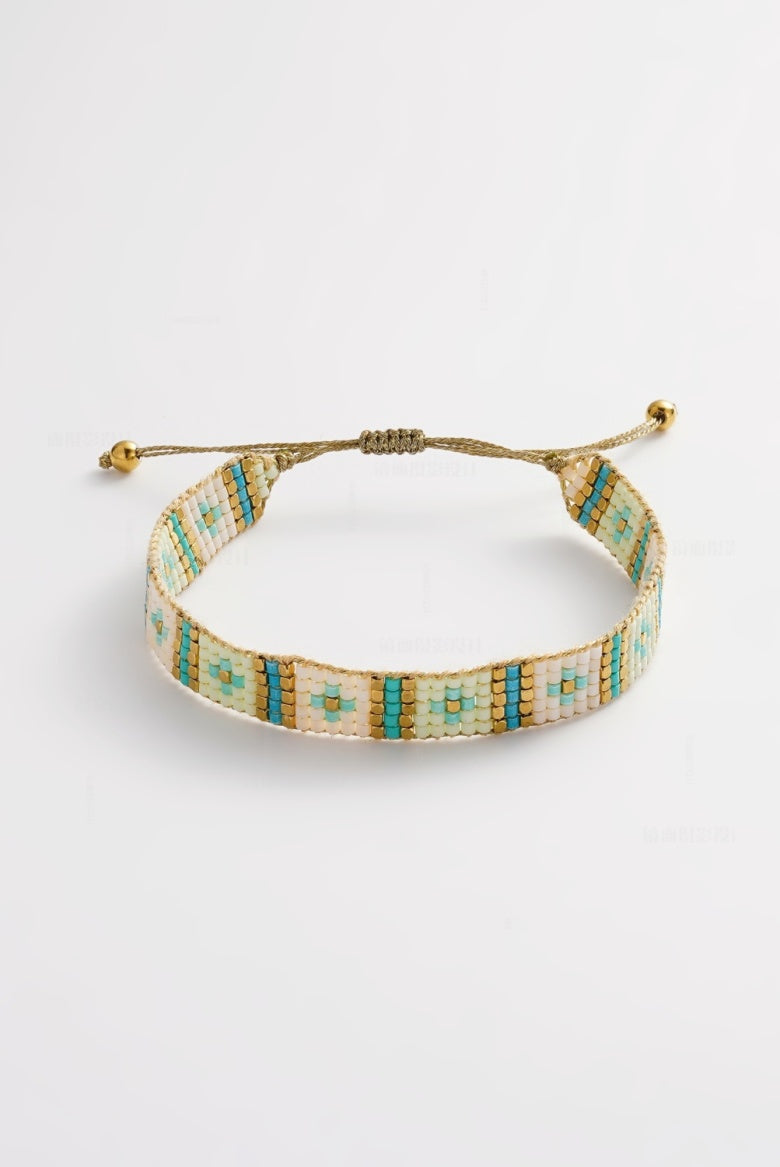 ZAFINO 8071 Zephyr Bracelet - Aqua Beaded bracelet with gold and turquoise pattern