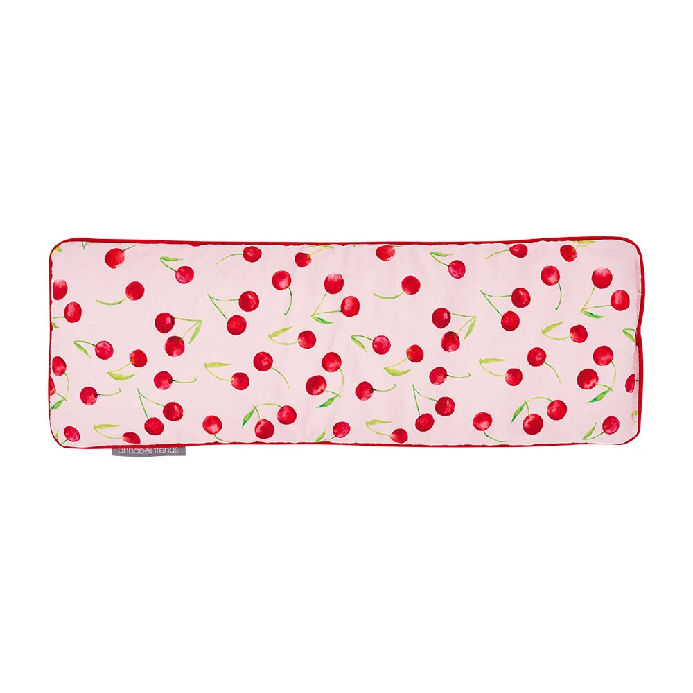 Folded pink blanket with cherry pattern and 'Australian Made' tag Cotton Heat Pillow - Cherrylicious