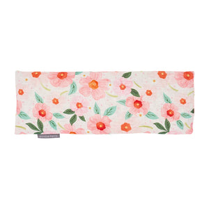 Floral-patterned heat pack with a bow and 'annabel Trends' branding Linen Heat Pillow - Meadow Blush