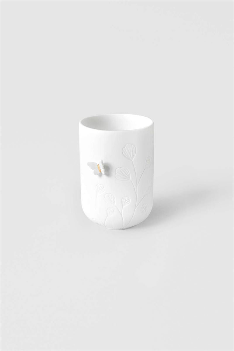Räder - Butterfly On Side - Tealight Holder White ceramic mug with a textured surface