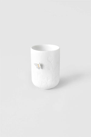 Räder - Butterfly On Side - Tealight Holder White ceramic mug with a textured surface