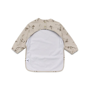 CRYWOLF MUCK-ABOUT APRON Puppies Beige long-sleeve bib with animal pattern