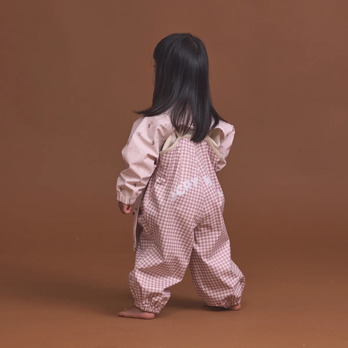 CRYWOLF MUCK-ABOUT APRON Pony Club Pink long-sleeve bib with animal pattern