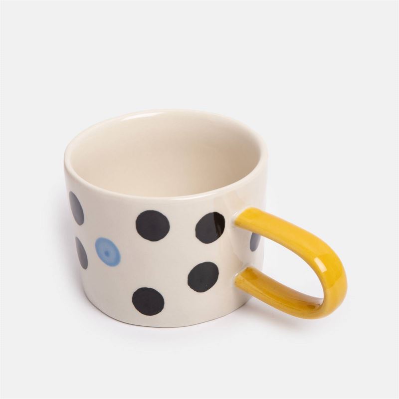 Caroline Gardner - Blue Accent Mono Dotty - Mug with black polka dots and a yellow handle