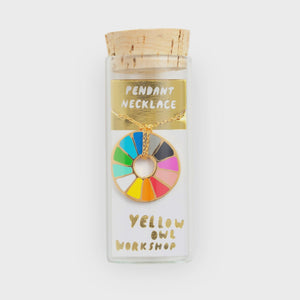 Colorful pendant necklace in a glass jar with a cork lid, branded 'Yellow Owl Workshop' Color Wheel Pendant