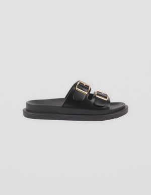 Stella+gemma Etienne Black slide sandal with gold buckles