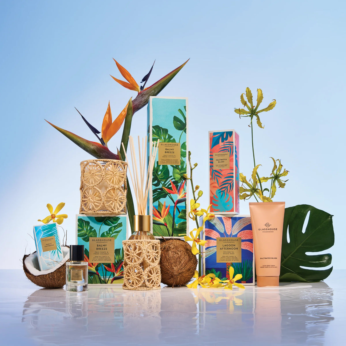 Glasshouse GF 380g Candle - Lagoon Afternoon -2026 limited edition Tropical-themed product with coconut, leaves, and a decorative box 