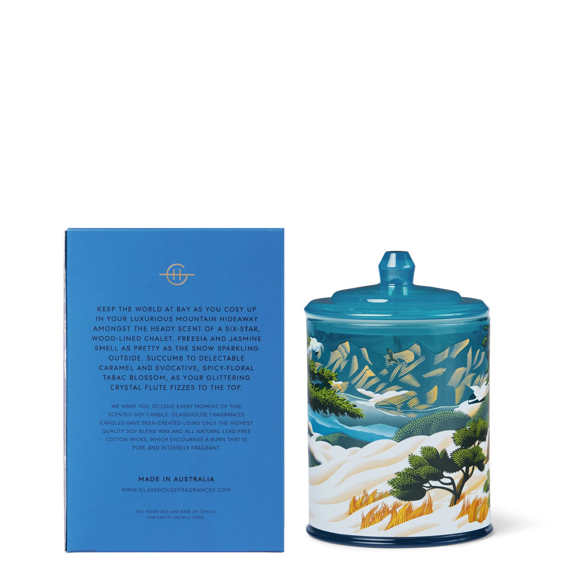 Glasshouse Fragrances Chalet Chic candle and packaging with mountain and nature design. AMBERWOOD OUD 380g Triple Scented Soy Candle Limited Edition