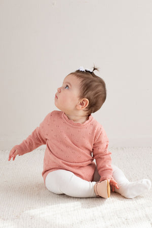 Burrow & Be Harper Knit Bodysuit - Petunia Pink baby romper with a subtle pattern