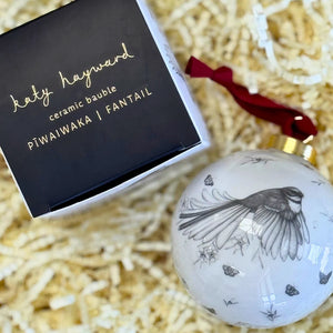 KATY HAYWARD CHRISTMAS DECORATION - COME FLY WITH ME - PIWAIWAKA/FANTAIL ceramic bauble