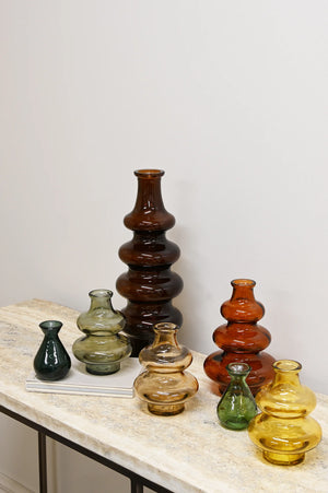 BROSTE Minerva Tall Bottle 40cm - Dark Earth A glossy amber-brown glass vase with a tiered, stacked bulbous design and a flared base