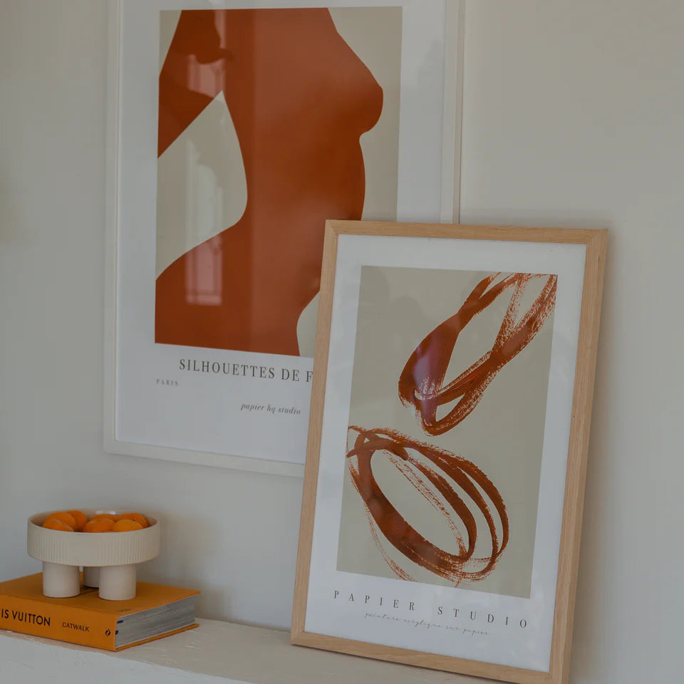PAPIER HQ  ENCLOSED PRINT RUST Abstract art print with brown brush strokes on a beige background, featuring 'Papier Studio' branding.