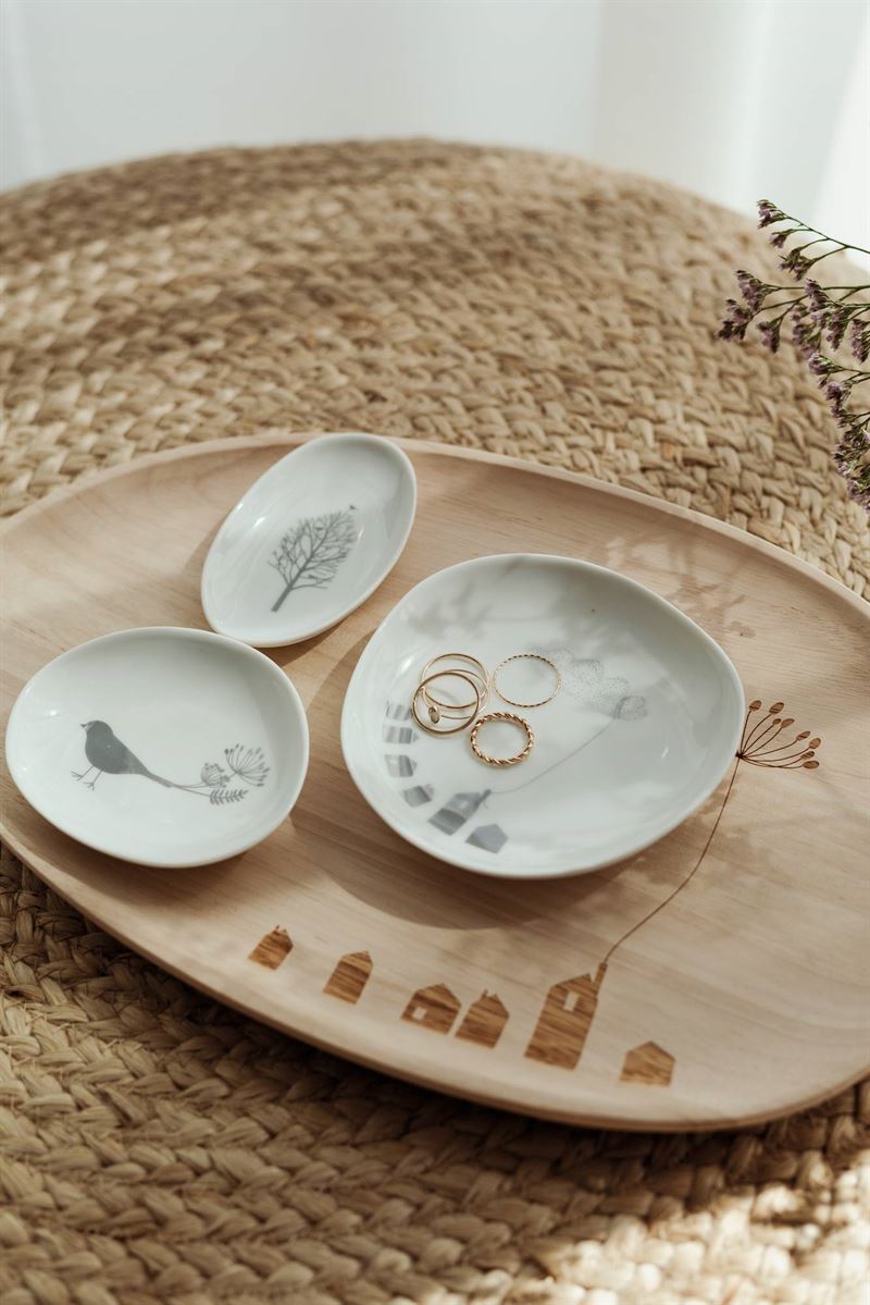 Räder - Birdhouse Wonderland Set of 3 - Porcelain Bowl Three decorative plates with black and white designs of a tree, bird, and house