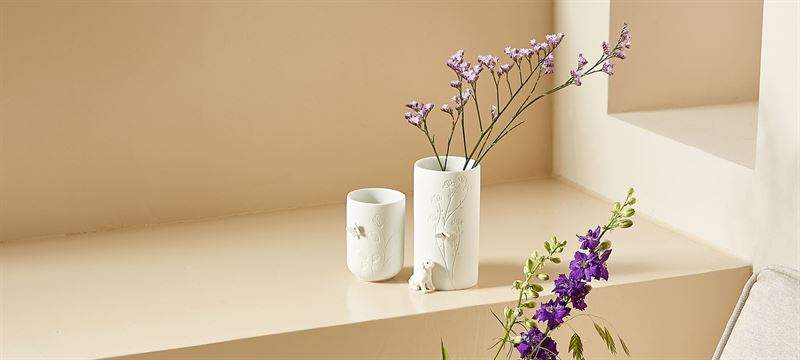 Räder - Butterfly On Side - Tealight Holder White ceramic mug with a textured surface