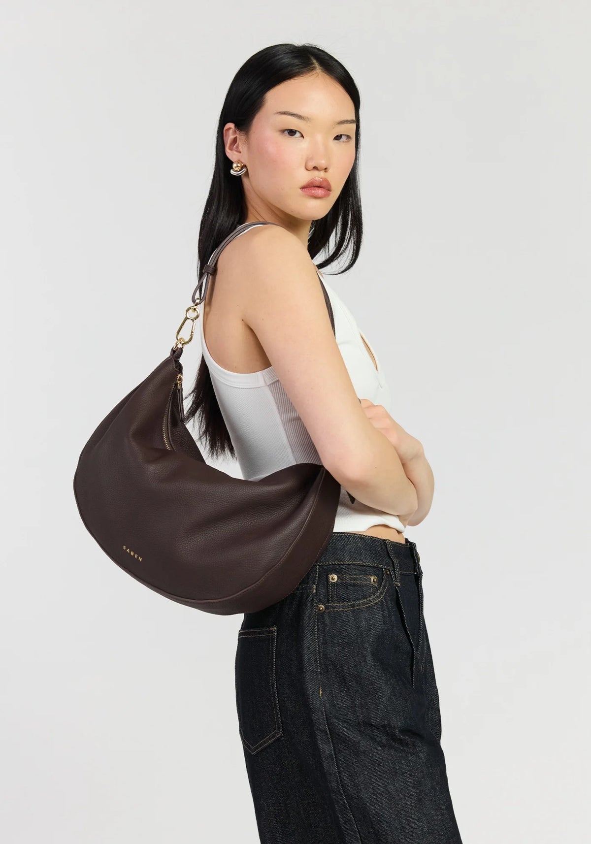 SABEN SS26 Noa Shoulder Bag - Cacao Luxe dark brown crescent-shaped leather shoulder bag