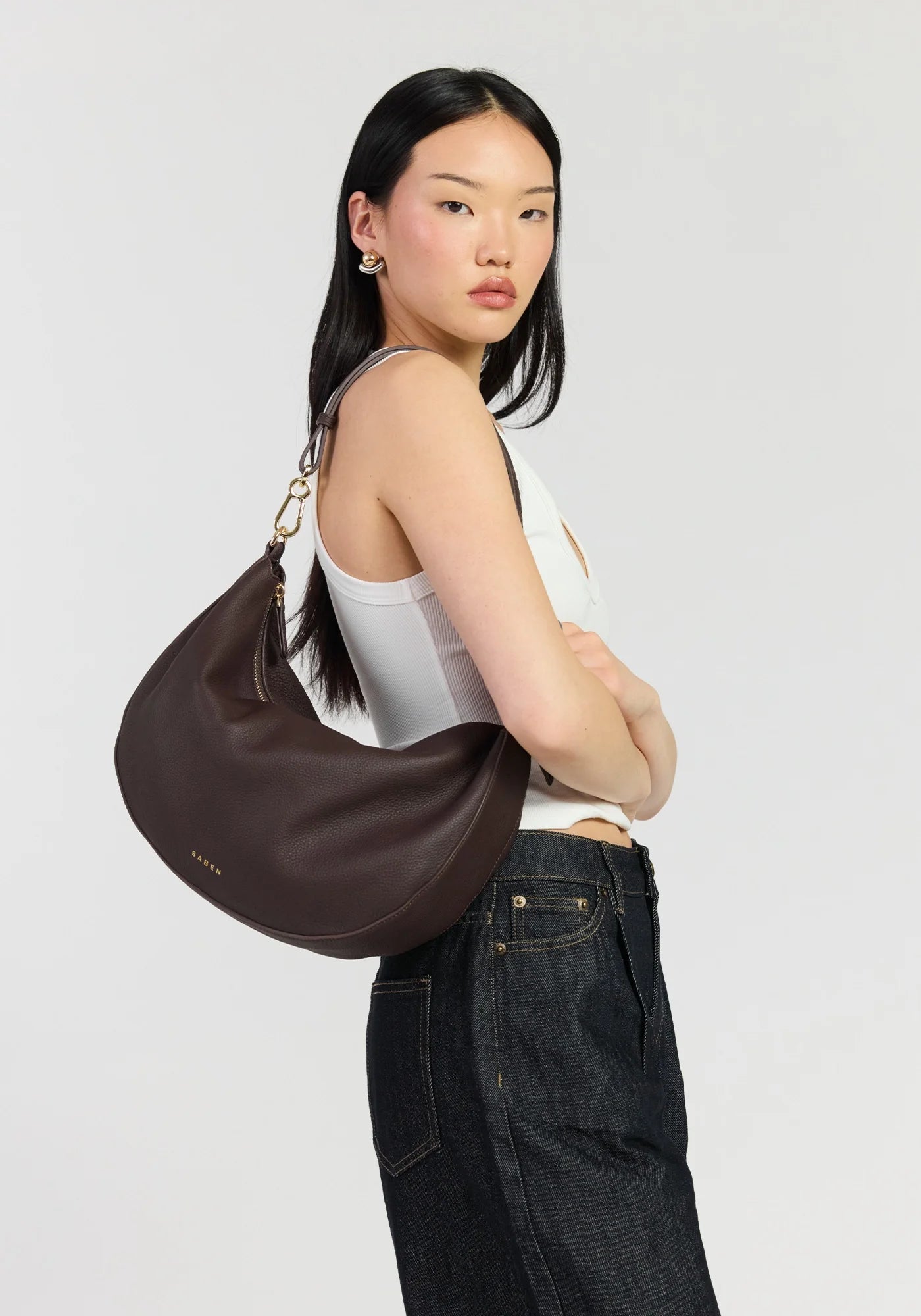 SABEN SS26 Noa Shoulder Bag - Cacao Luxe dark brown crescent-shaped leather shoulder bag