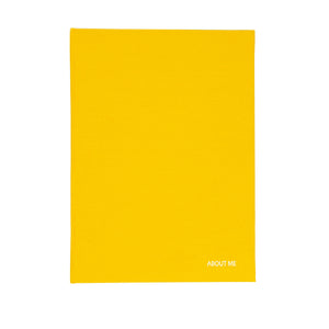 Suck UK My Height Chart A children's collapsible height chart book shown standing upright on a light gray background. The cover is white with bold yellow text reading 'MY HEIGHT CHART,' plus illustrations of folded pages and a young girl in a light blue dress standing beside the chart area.
