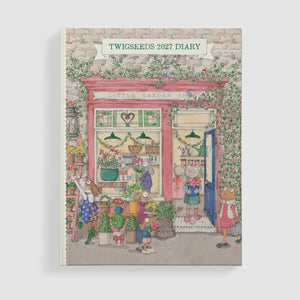 Twigseeds 2027 Diary, featuring a whimsical illustration of a flower shop with animal characters on the cover, shown standing upright against a clean white background.