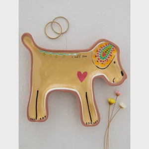 Natural Life Terracotta Trinket Dish - Dog A ceramic wall-mounted dog-shaped holder in warm beige with hand-painted details, including a pink heart, colorful floral pattern on the head, and the text 'I TUFF YOU'
