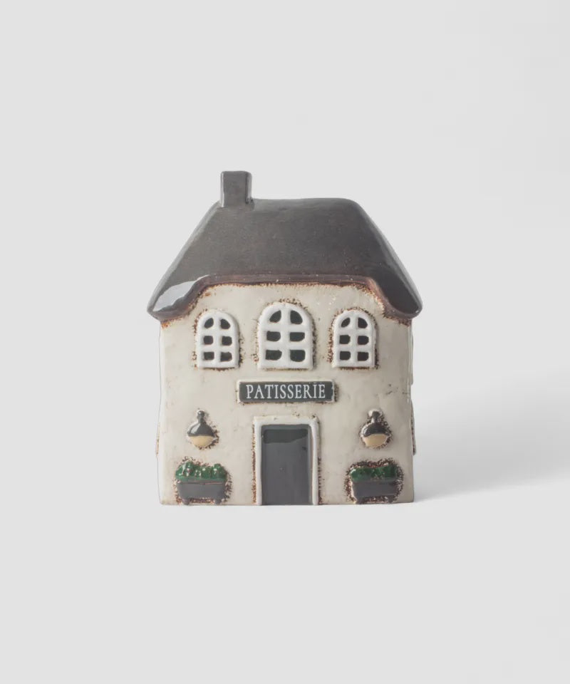 French Country Collections The Village Patisserie Tea Light Small ceramic house model with 'Patisserie' sign