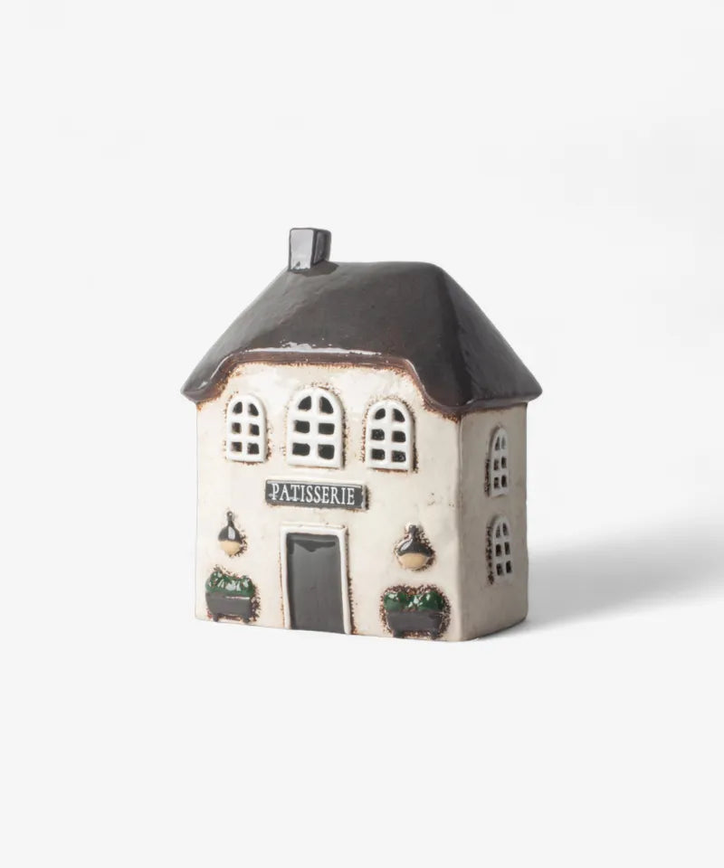 French Country Collections The Village Patisserie Tea Light Small ceramic house model with 'Patisserie' sign