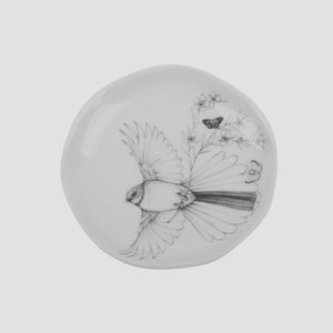 KATY HAYWARD Trinket Dish - Come Fly With Me - Piwaiwaka/Fantail Round ceramic plate with a black and white illustration of a bird and flowers