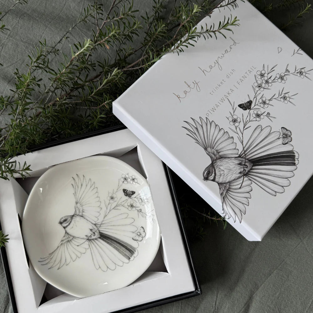KATY HAYWARD Trinket Dish - Come Fly With Me - Piwaiwaka/Fantail Round ceramic plate with a black and white illustration of a bird and flowers