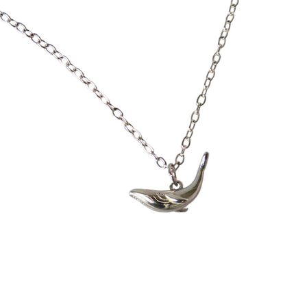 Wildside Gifts Humpback Whale Pendant A silver whale-shaped pendant necklace