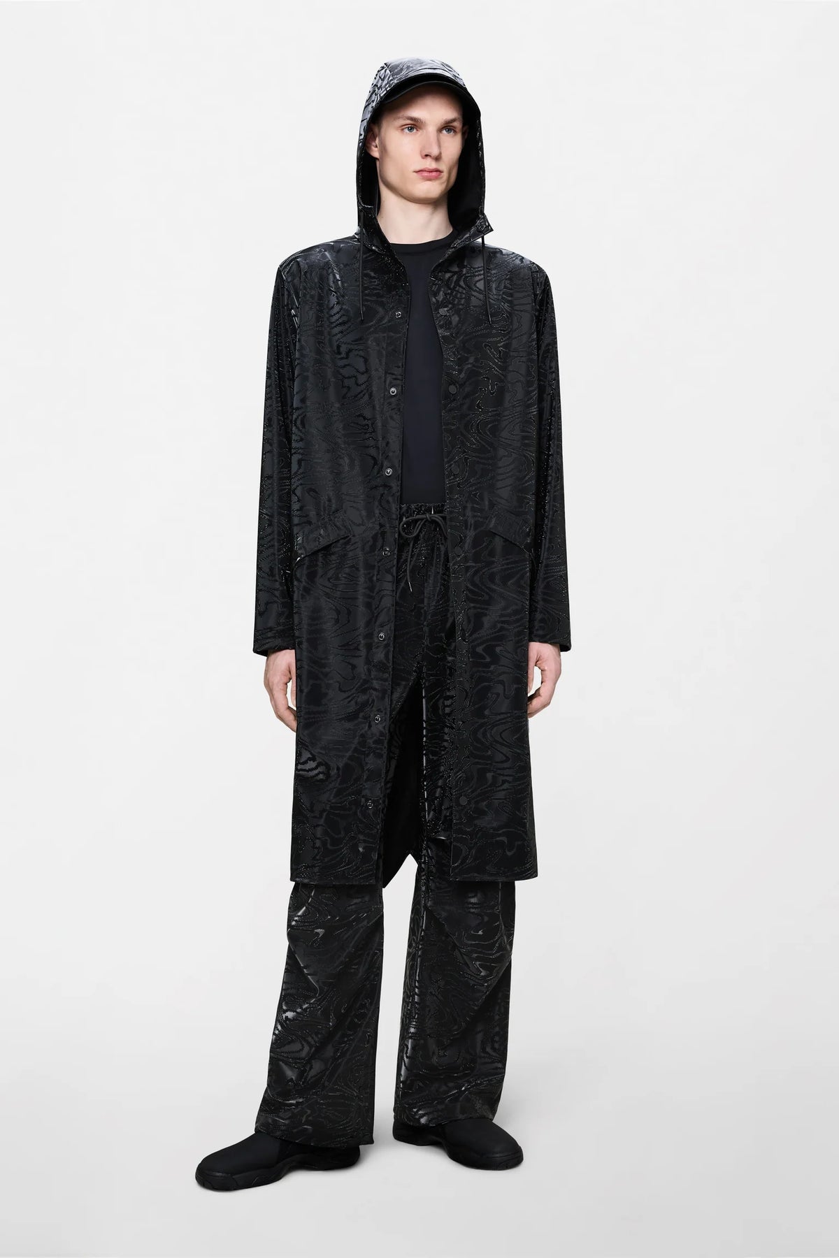RAINS Longer Jacket W3 - Amp Black raincoat with a pattern