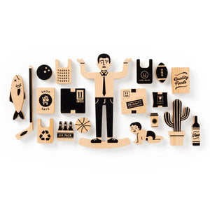 Brass Monkey One Trip Nick Wooden Balance Game Wooden balance game packaging with illustration of a person holding boxes