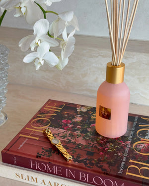 Glasshouse GF 250ml Diffuser - Radiance In Bloom 2026 Pink diffuser bottle with gold cap and floral packaging