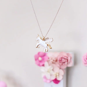 Flying Unicorn Necklace Unicorn necklace on a display card with 'Lauren Hinkley Australia' 