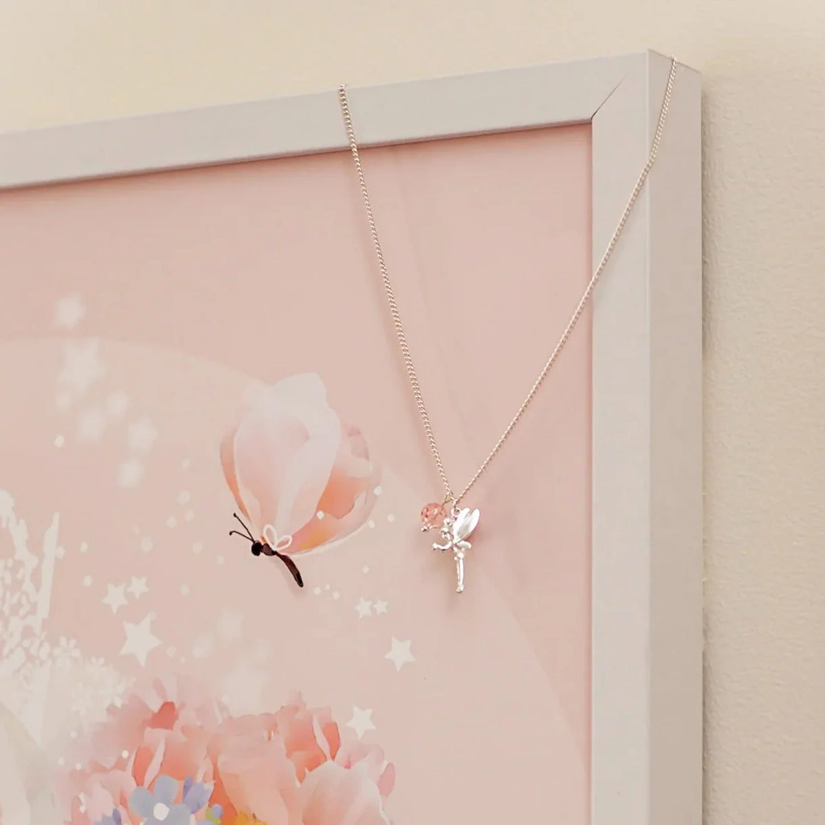 LAUREN HINKLEY Fairy Necklace Silver fairy pendant necklace with a pink bead