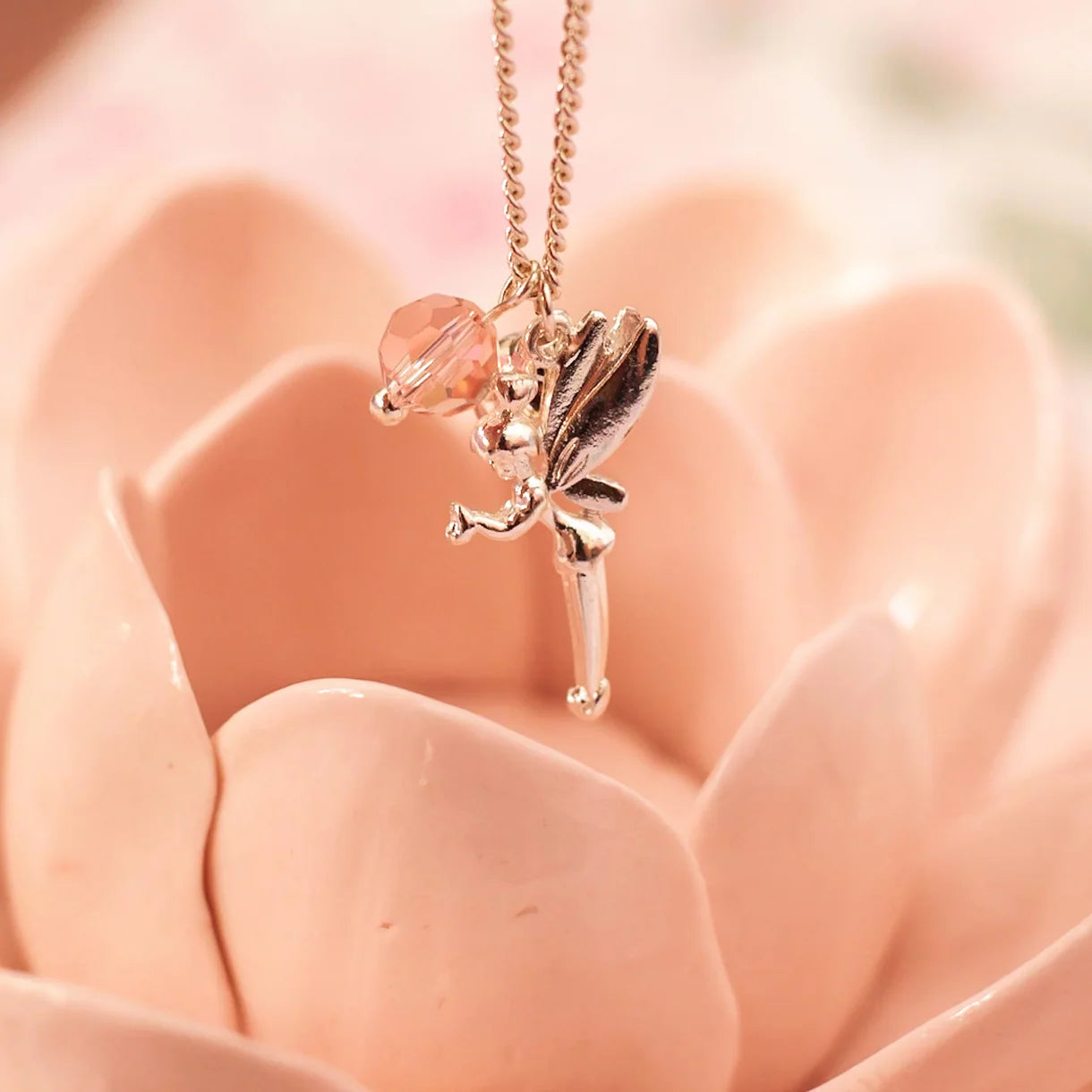 LAUREN HINKLEY Fairy Necklace Silver fairy pendant necklace with a pink bead
