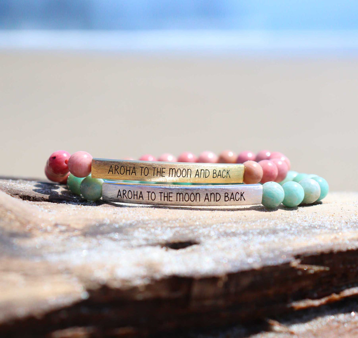 Little Taonga Amazonite Gemstone Bracelet – Aroha to the moon and back A beaded stretch bracelet made of polished round beads in light aqua, mint green, and white with natural marbling