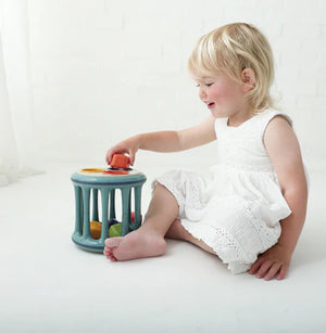 TOLO Rolling Shape Sorter Bio Range Colorful toy with a cylindrical shape and various geometric blocks